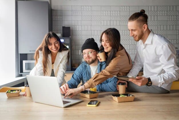 Four people working together and sharing ideas